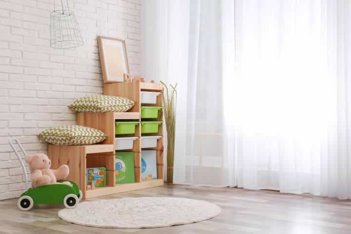 Modern eco style interior of child room with wooden crates 